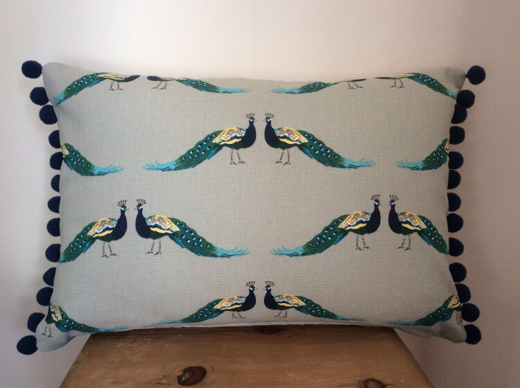 Cushion in beautiful peacock design